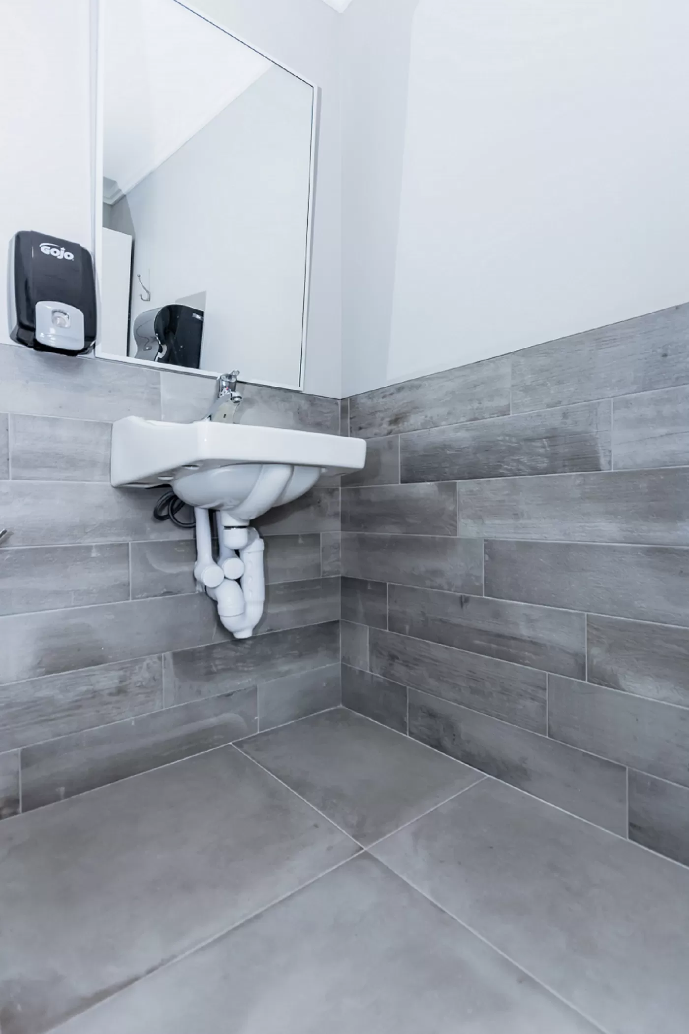 Tiled Bathroom Floor and Wall