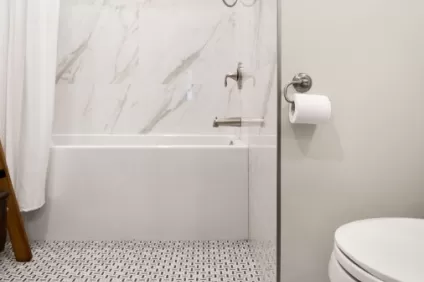 Gorgeous Bathroom with deco-inspired floor tile